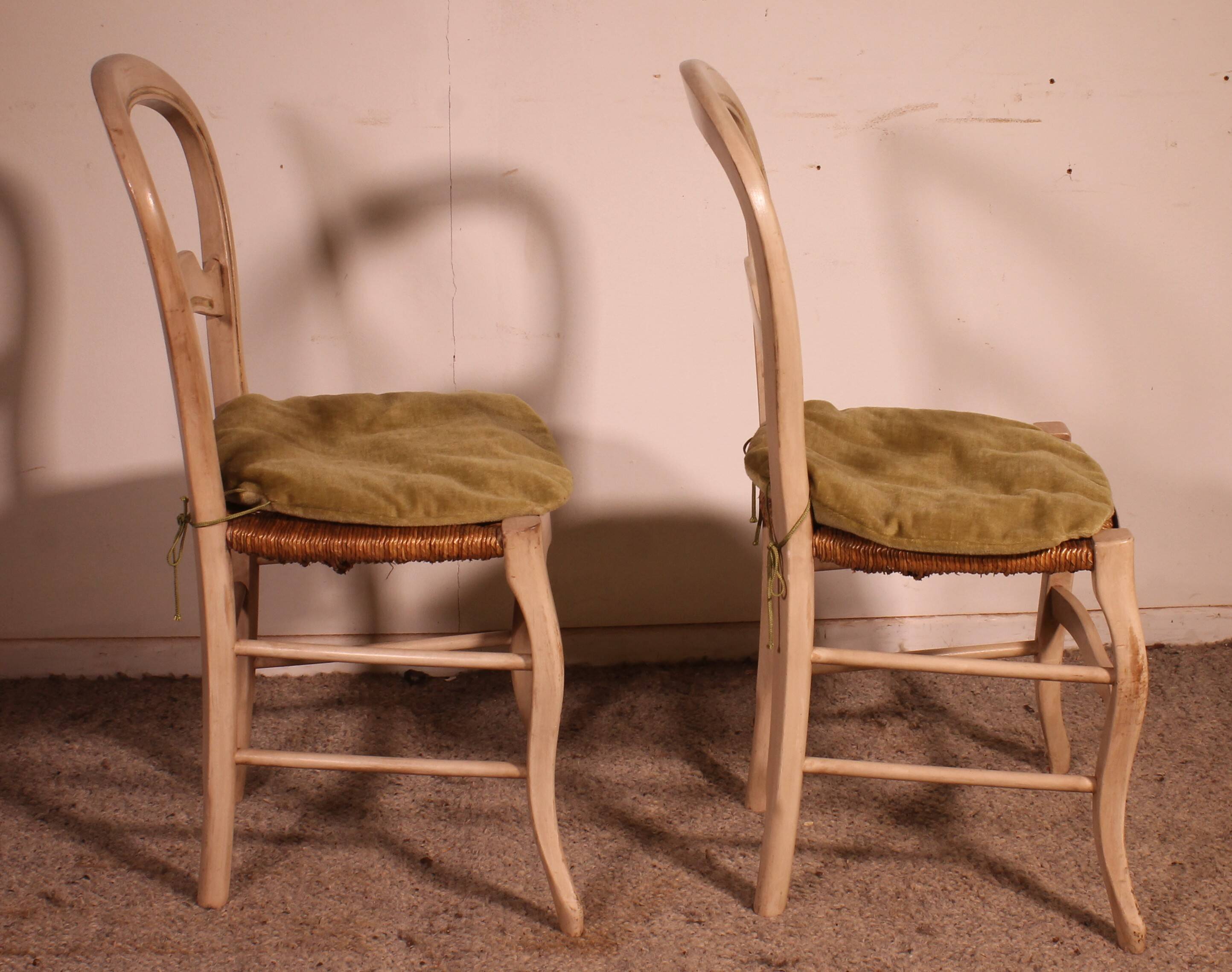 2 chaises paillées en bois polychrome