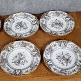 Set of 6 plates plus 1 in English porcelain, early 20th century