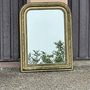 Miroir Louis Philippe en bois doré à frise ajourée