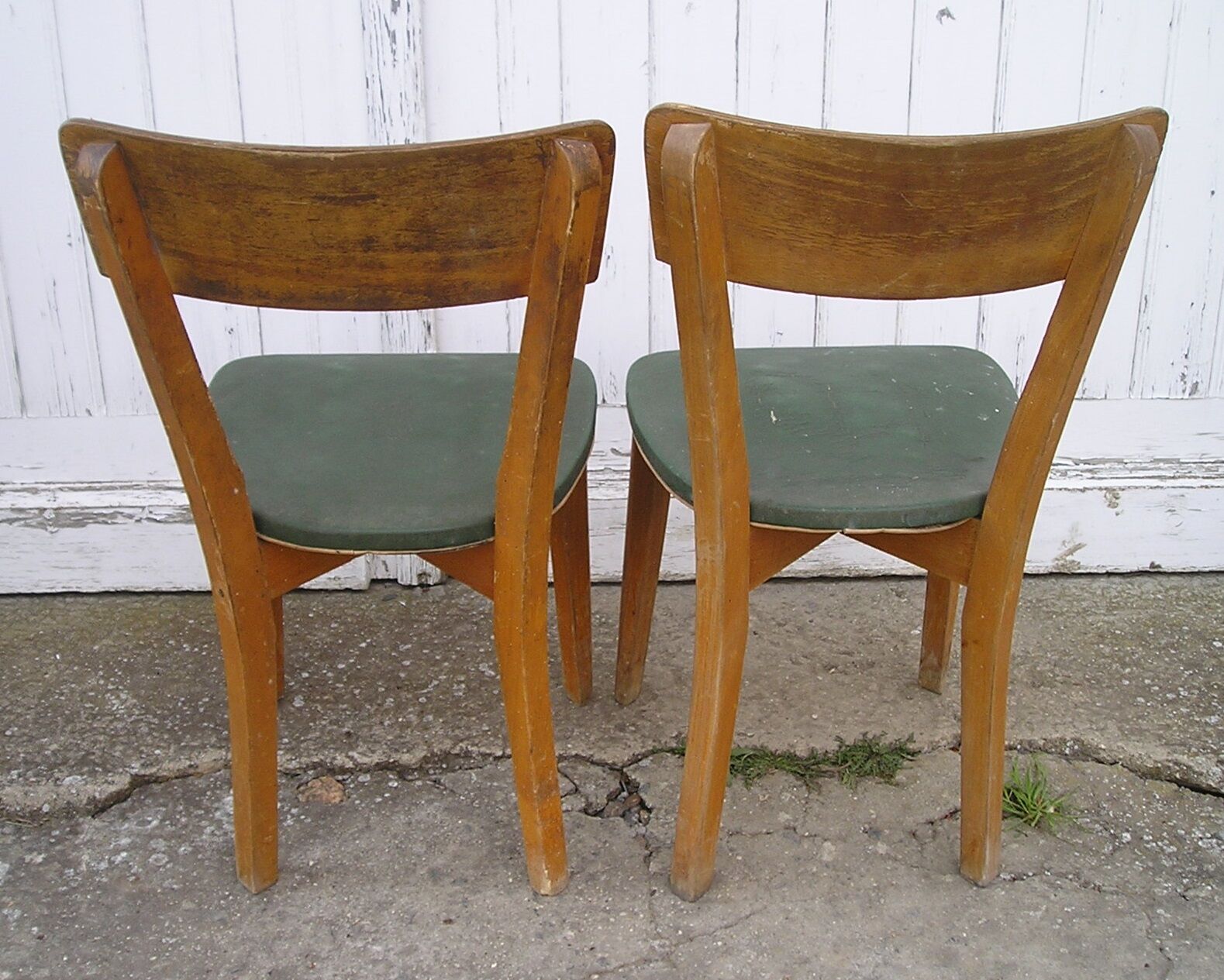 Pair of 1960 chairs, green skai and wood