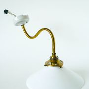 Swan neck wall light in smooth opaline and brass, early 20th century.