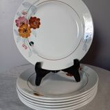 7 flowered dessert plates, St Amand factory, 1930