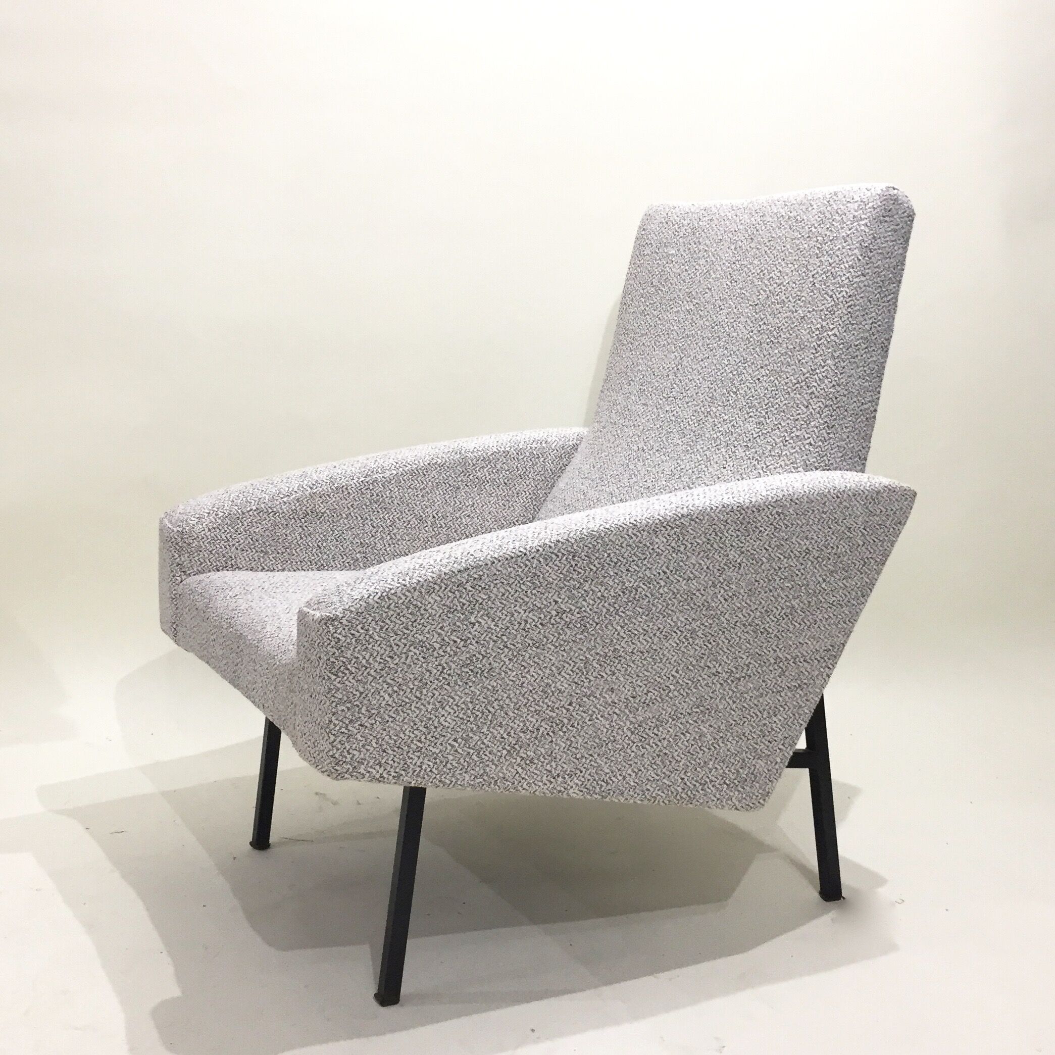 Reupholstered modernist armchair