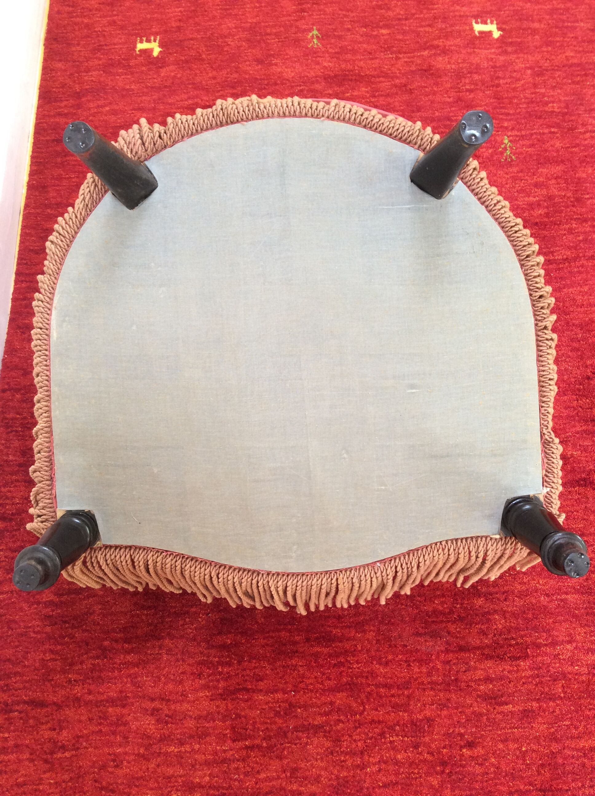 Toad in powder pink velvet armchair