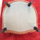 Toad in powder pink velvet armchair