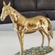 Large vintage sculpture Horse at rest, in solid brass. 22 x 30 cm