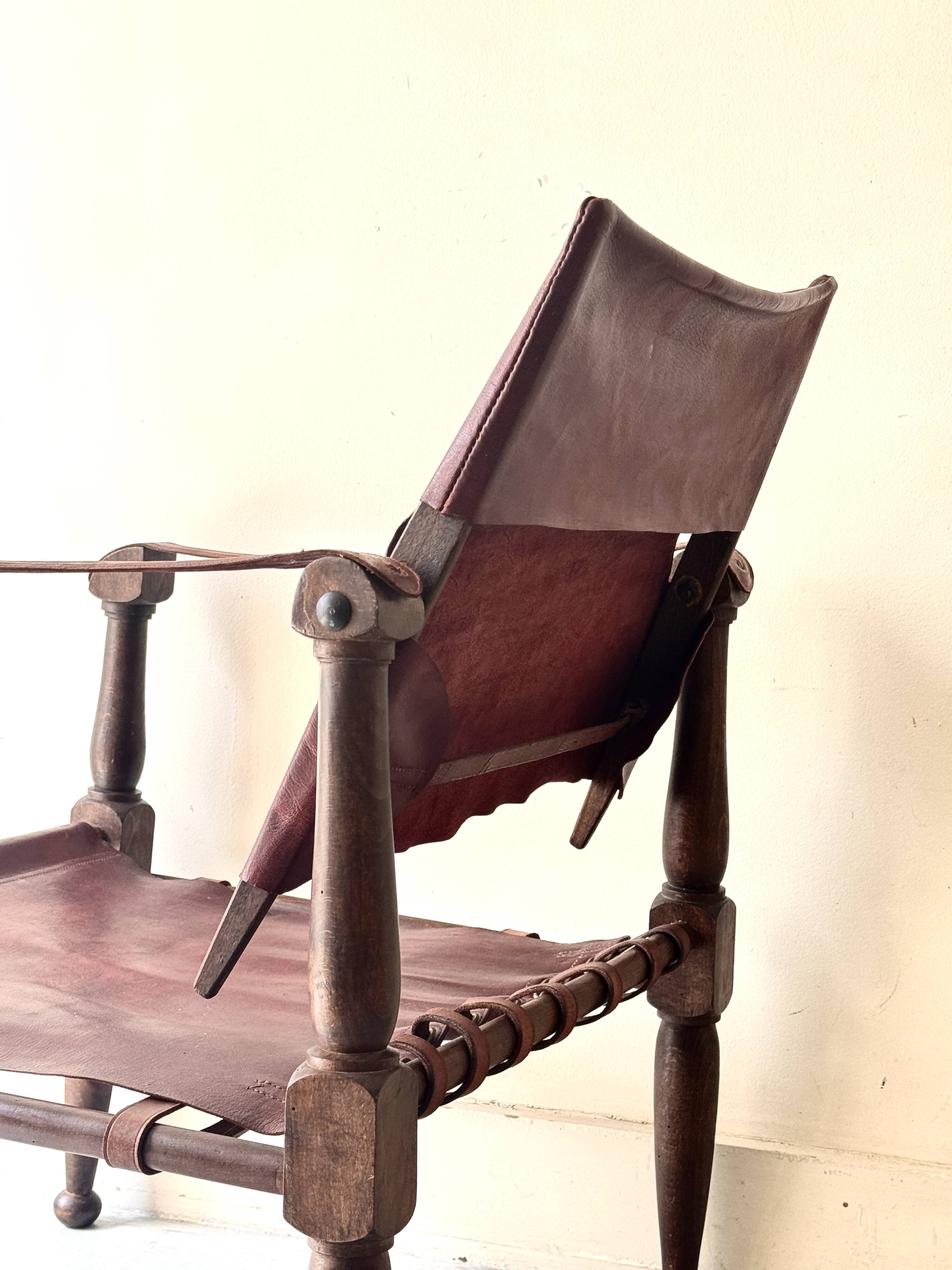 Scandinavian safari armchair in wood & burgundy leather upholstery 20th century