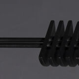 Floor lamp made from black painted metal with balancing arm