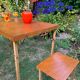 Old suitcase, table and stools, vintage wooden picnic