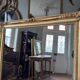 Restoration period mirror in gilded wood from the Napoleonic III era, 165 cm x 130 cm.
