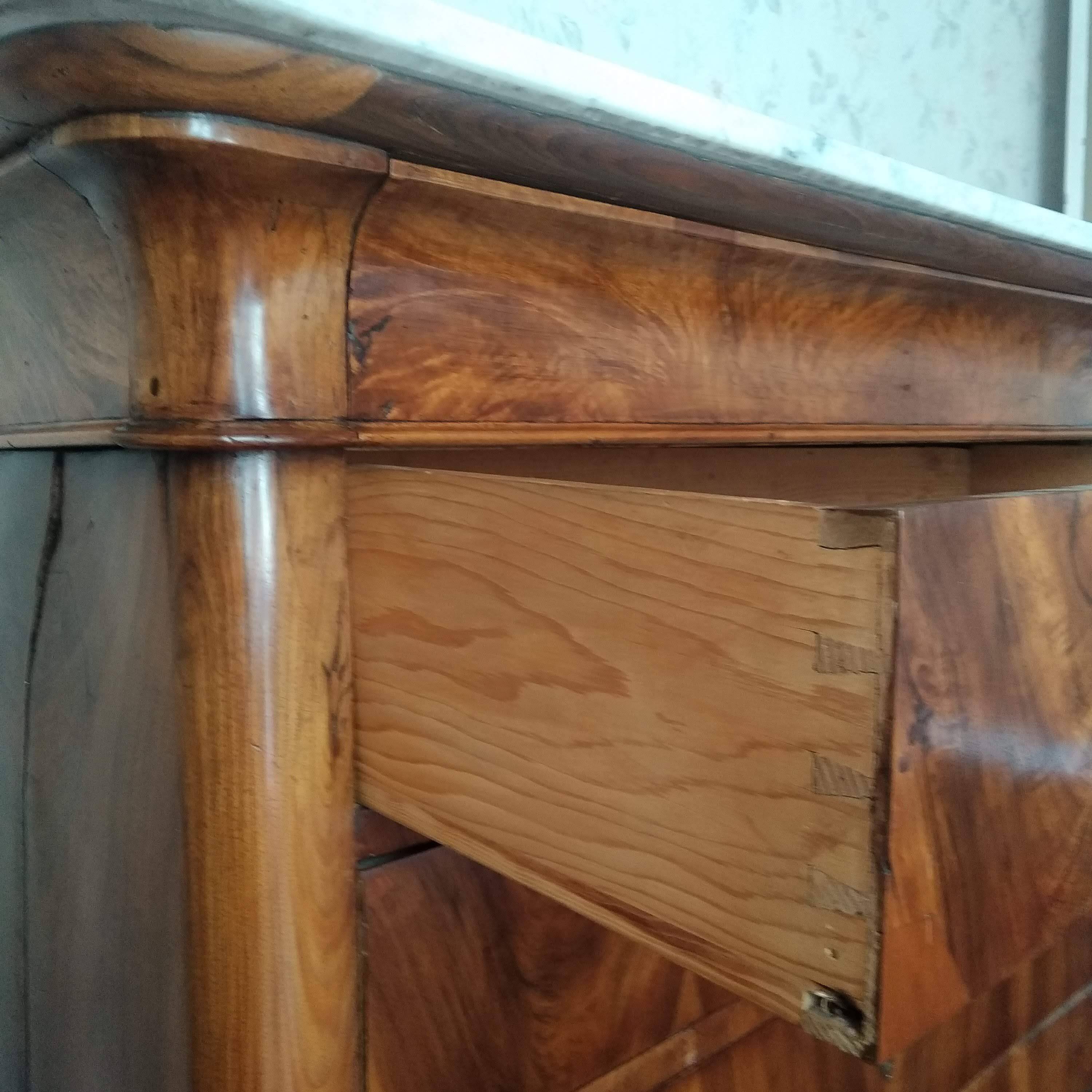 Antique Louis Philippe chest of drawers with lion paws