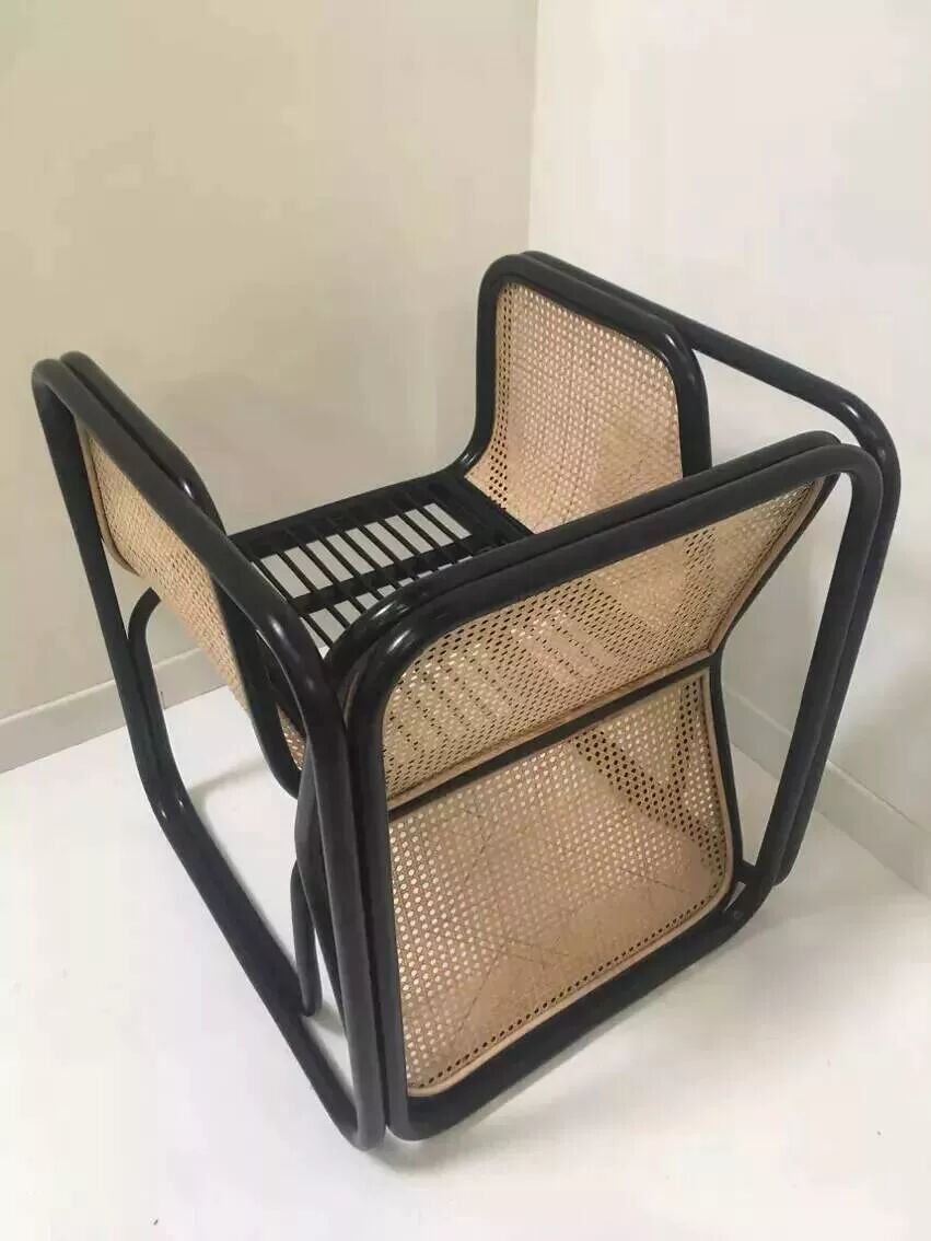 Armchair in black lacquered rattan and natural cane