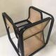 Fauteuil en rotin laqué noir et cannage naturel