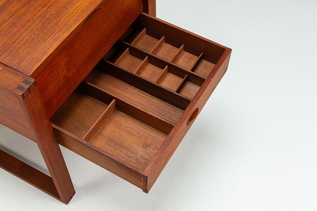 Scandinavian modern storage cabinet in teak with sled base Denmark 1960
