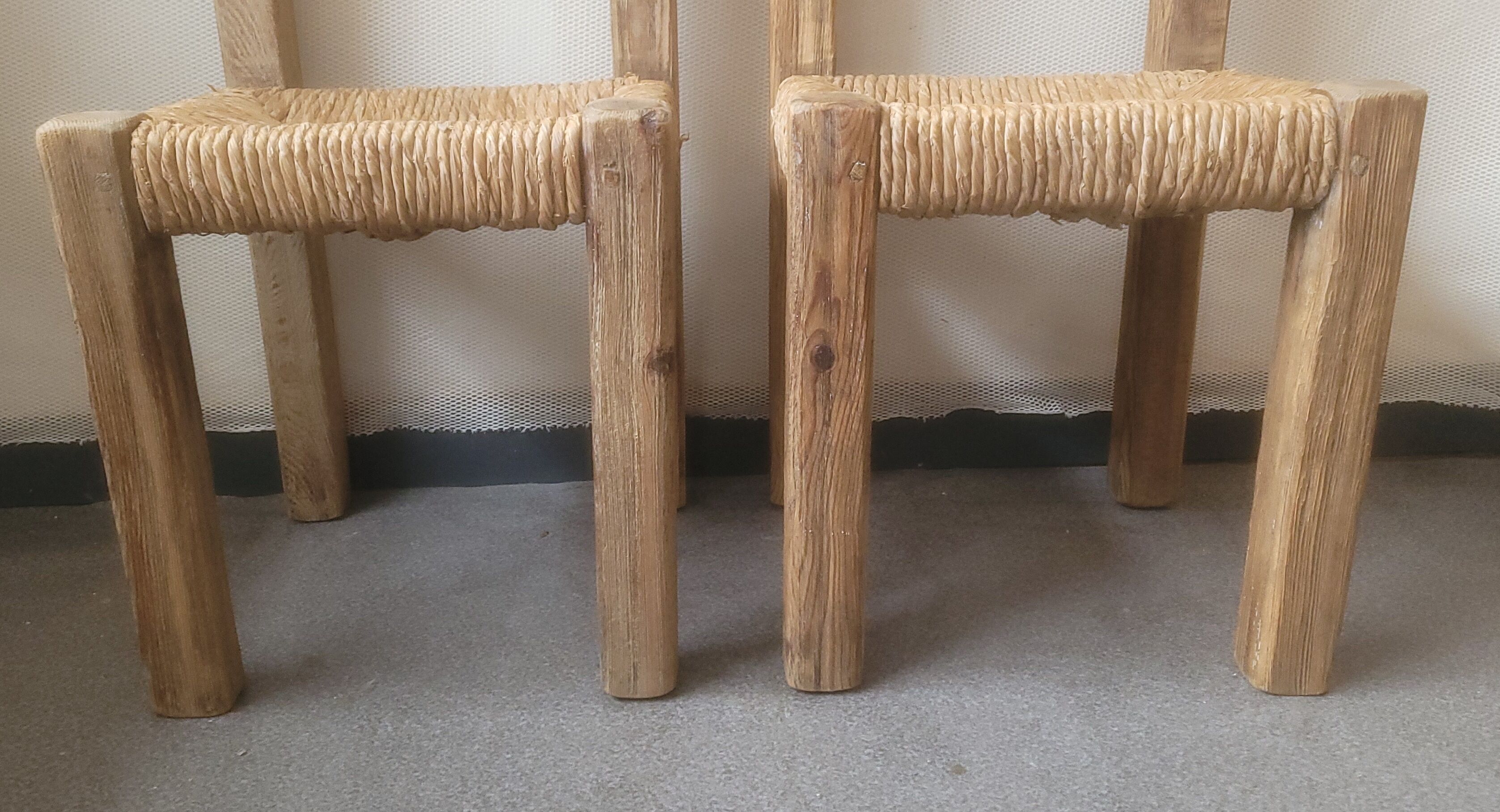 Pair of brutalist chairs in wood and straw