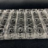 Set of 12 molded glass or crystal knife rests with diamond point decor