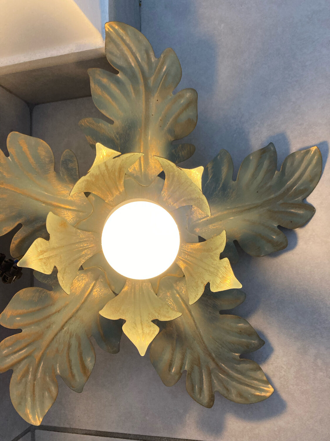Metal flower sconce