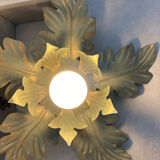 Metal flower sconce