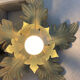 Metal flower sconce