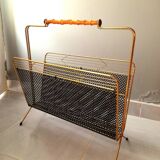 Perforated metal magazine rack 1950