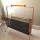 Perforated metal magazine rack 1950