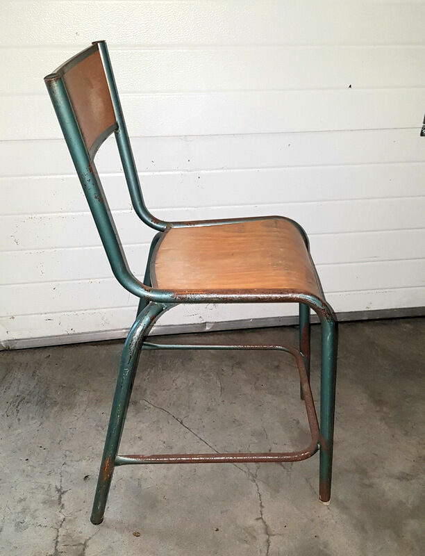 Old science school chair in tube