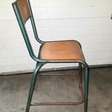 Old science school chair in tube