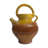 E-mailed terracotta jug or kid.