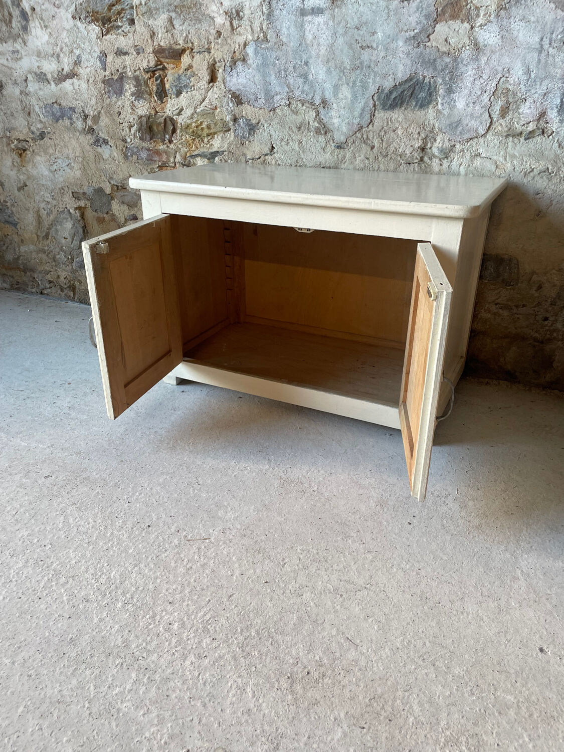 Antique white patinated low cabinet