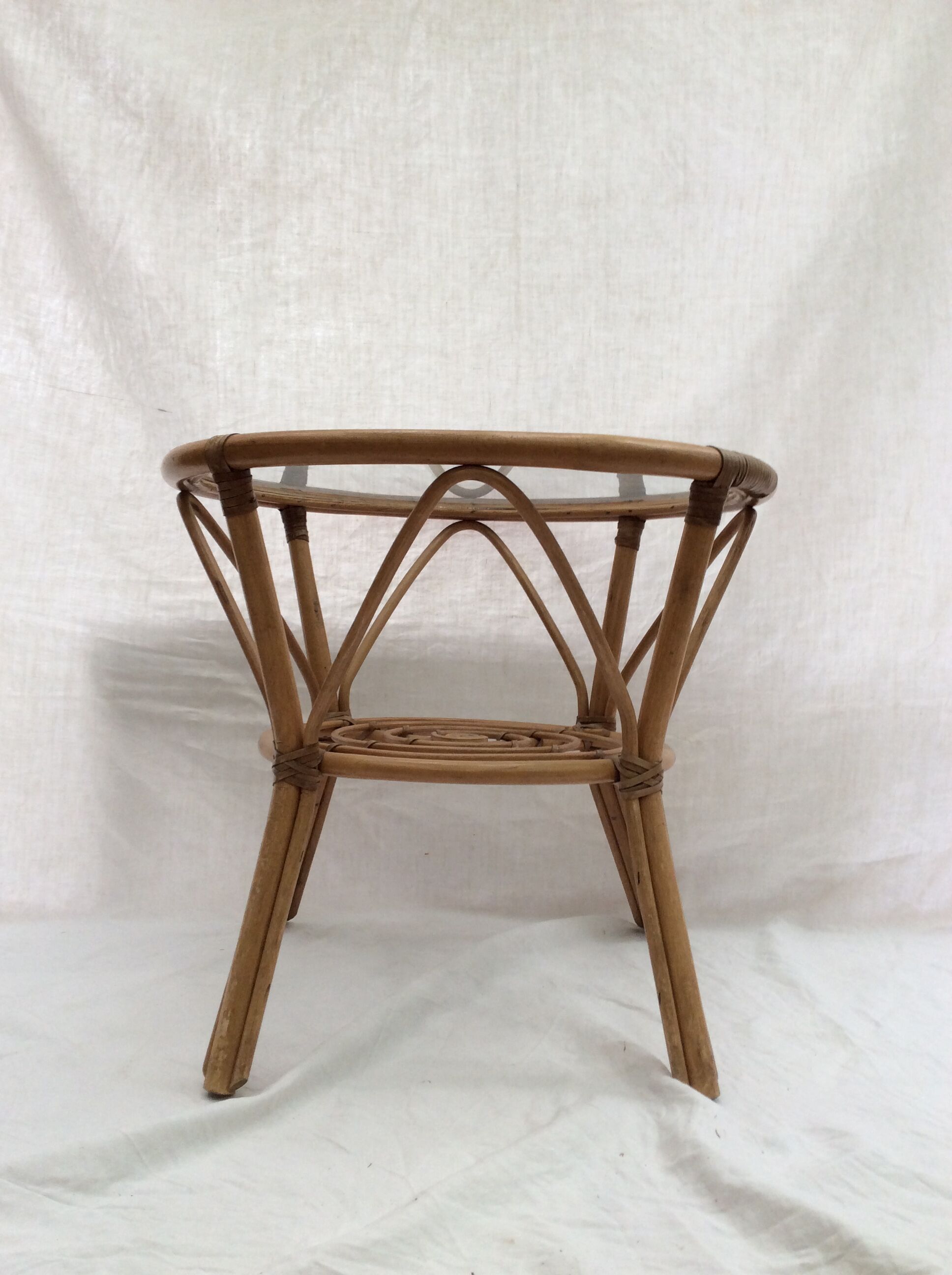Table in rattan, bamboo and glass