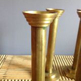 Series of 4 brass candlesticks