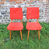 2 old red 'moumoute' chairs
