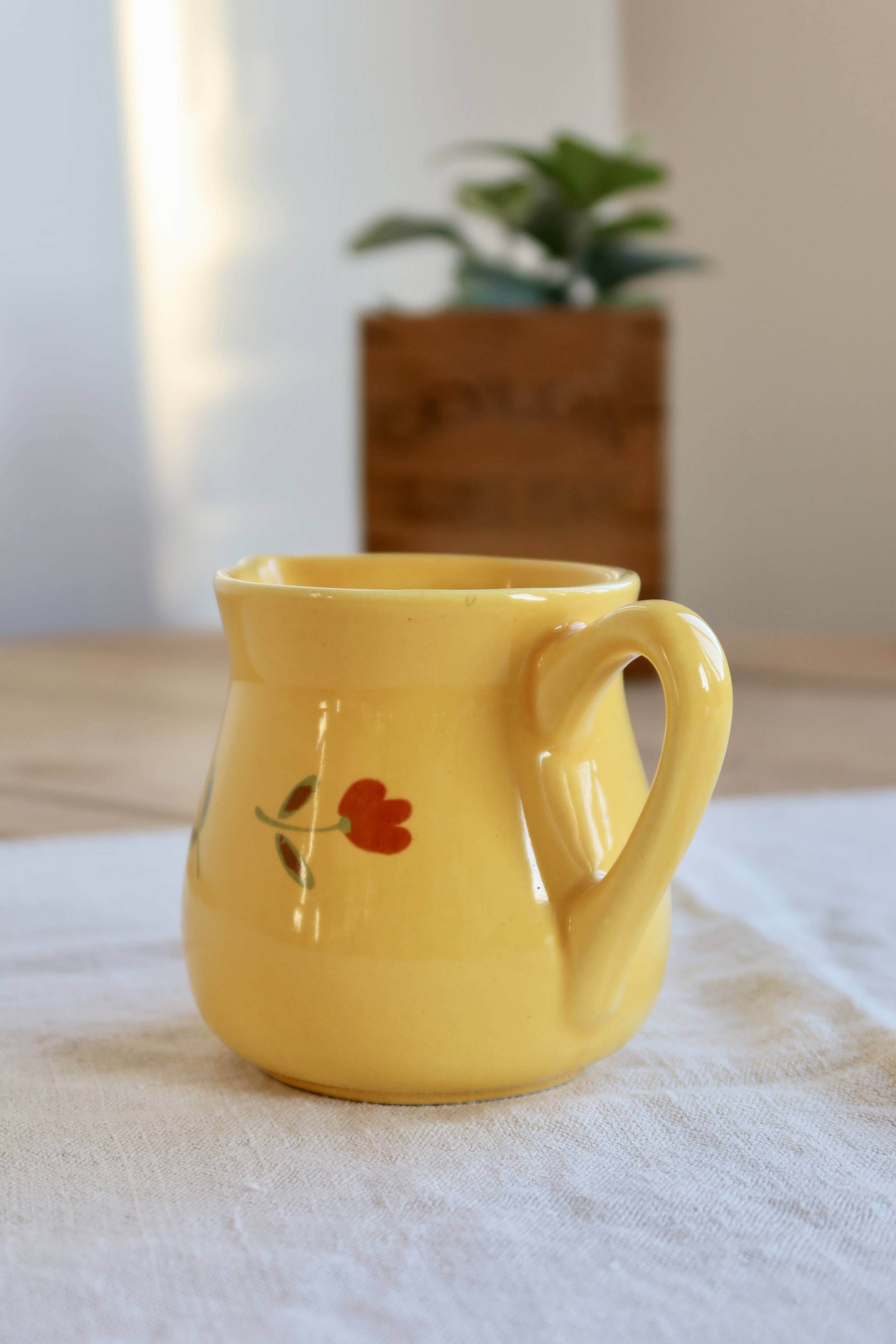 Vintage yellow ceramic milk jug – Hand-painted floral pattern