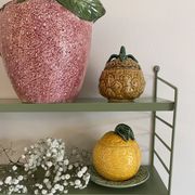 Set of ceramic fruits, a strawberry decanter and two lemon and pineapple jam jars