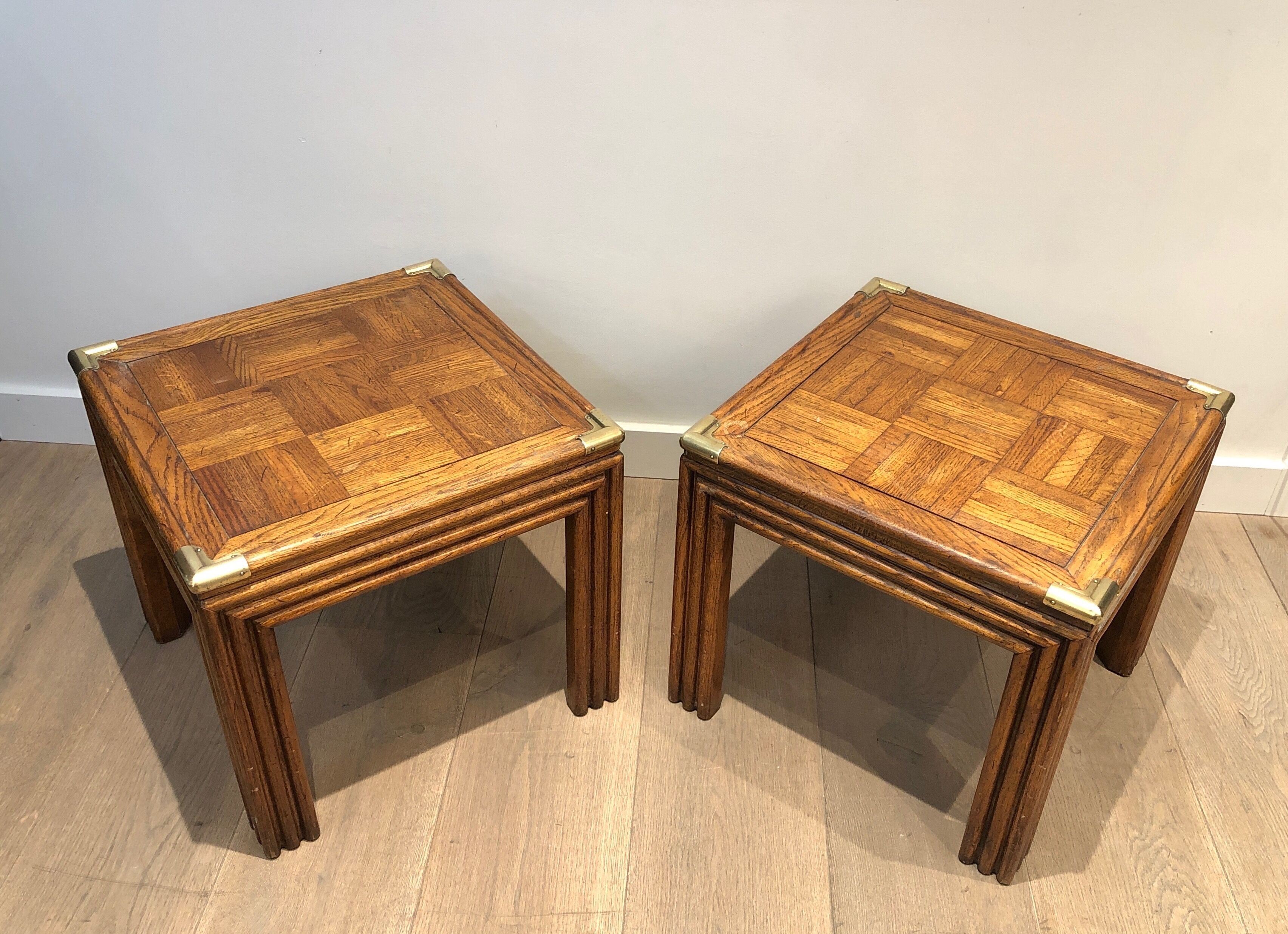 Pair of wooden and brass sofa ends