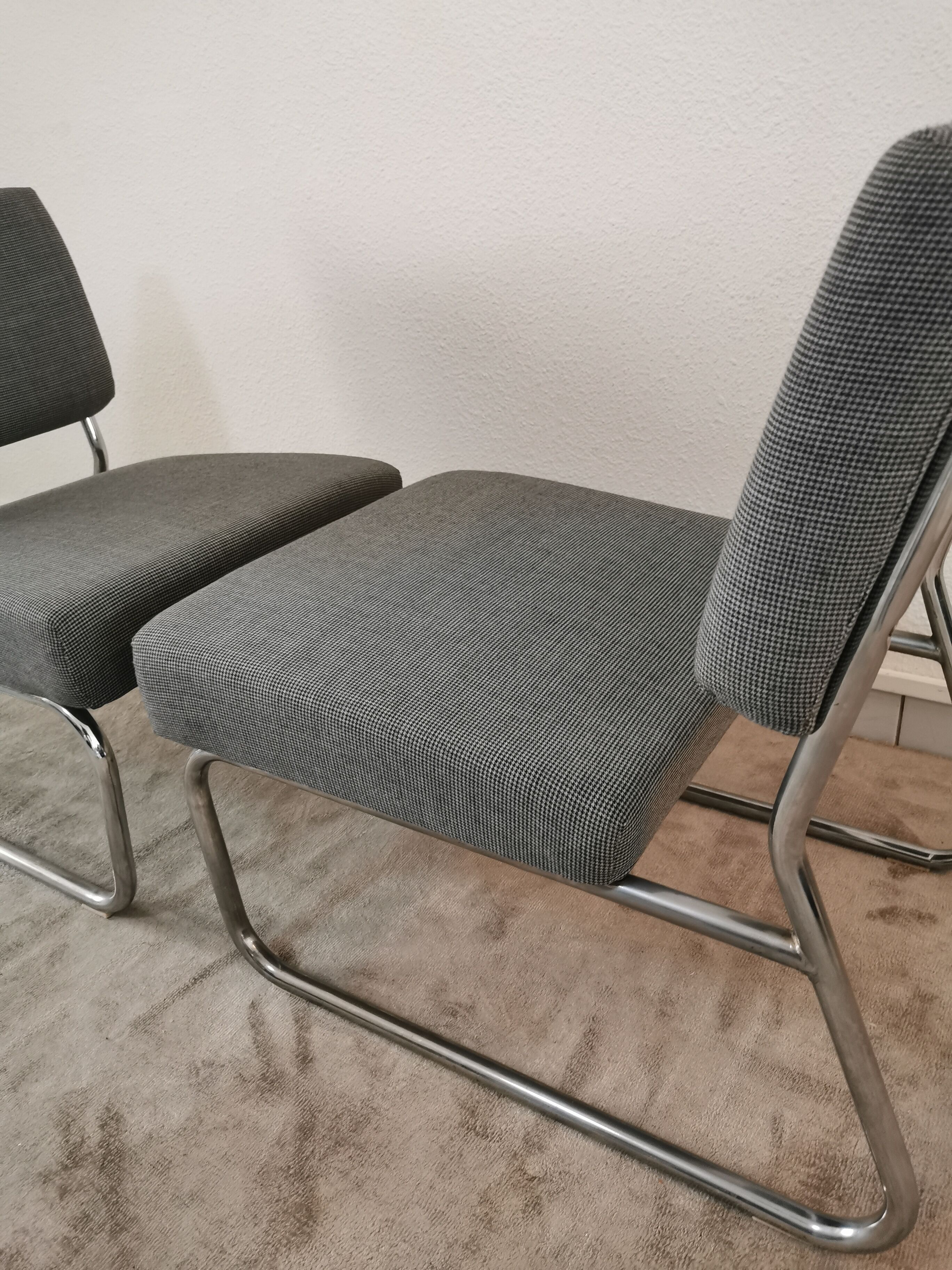 Pair of vintage chrome armchairs and "chicken foot" fabrics