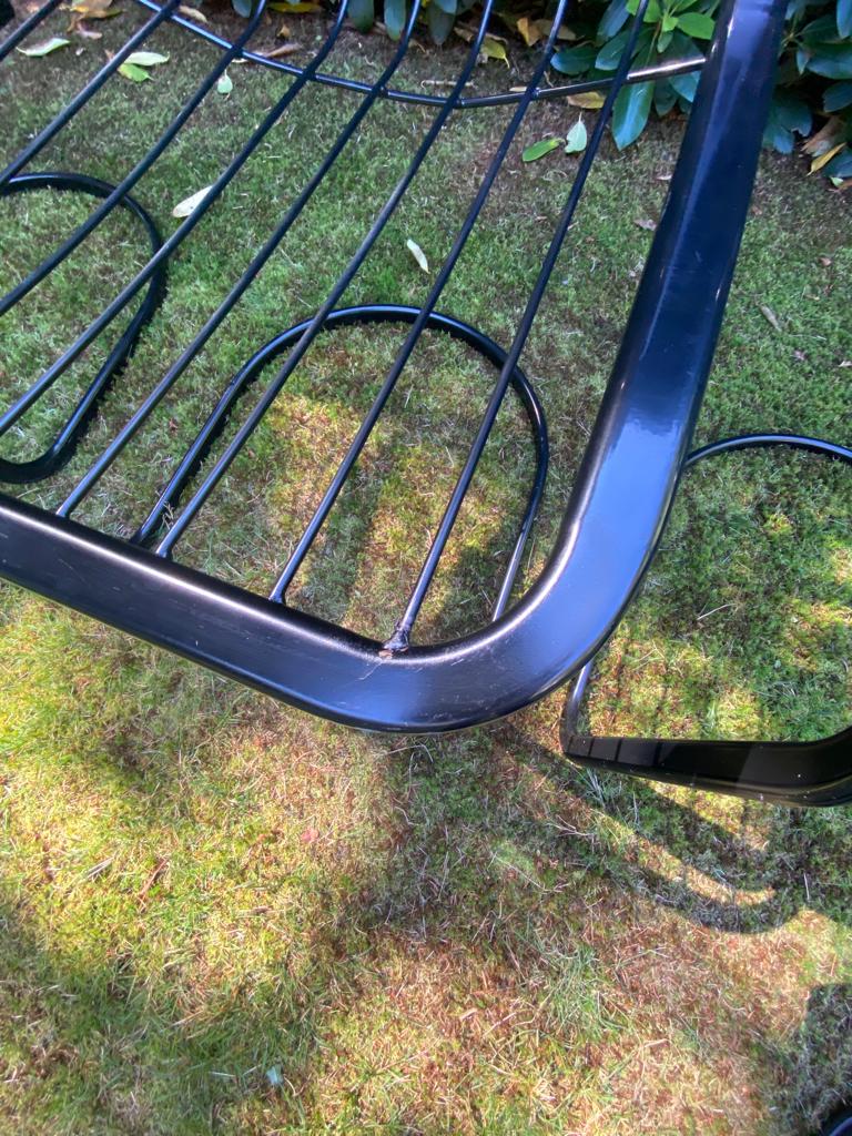 Set of four black highback dining chairs,  1970s