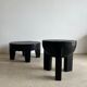 Black mango wood tripod side table with a semi-spherical top, height: 45 cm, diameter: 44 cm.