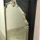 Trumeau mirror in black and silver patinated wood in Louis XV style