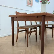 Vintage extendable dining table with 2 extensions in teak.