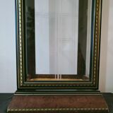 Wooden showcase and gilded motifs 1970
