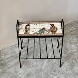 Vintage magazine table with Greek mythology motif.