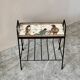 Vintage magazine table with Greek mythology design.