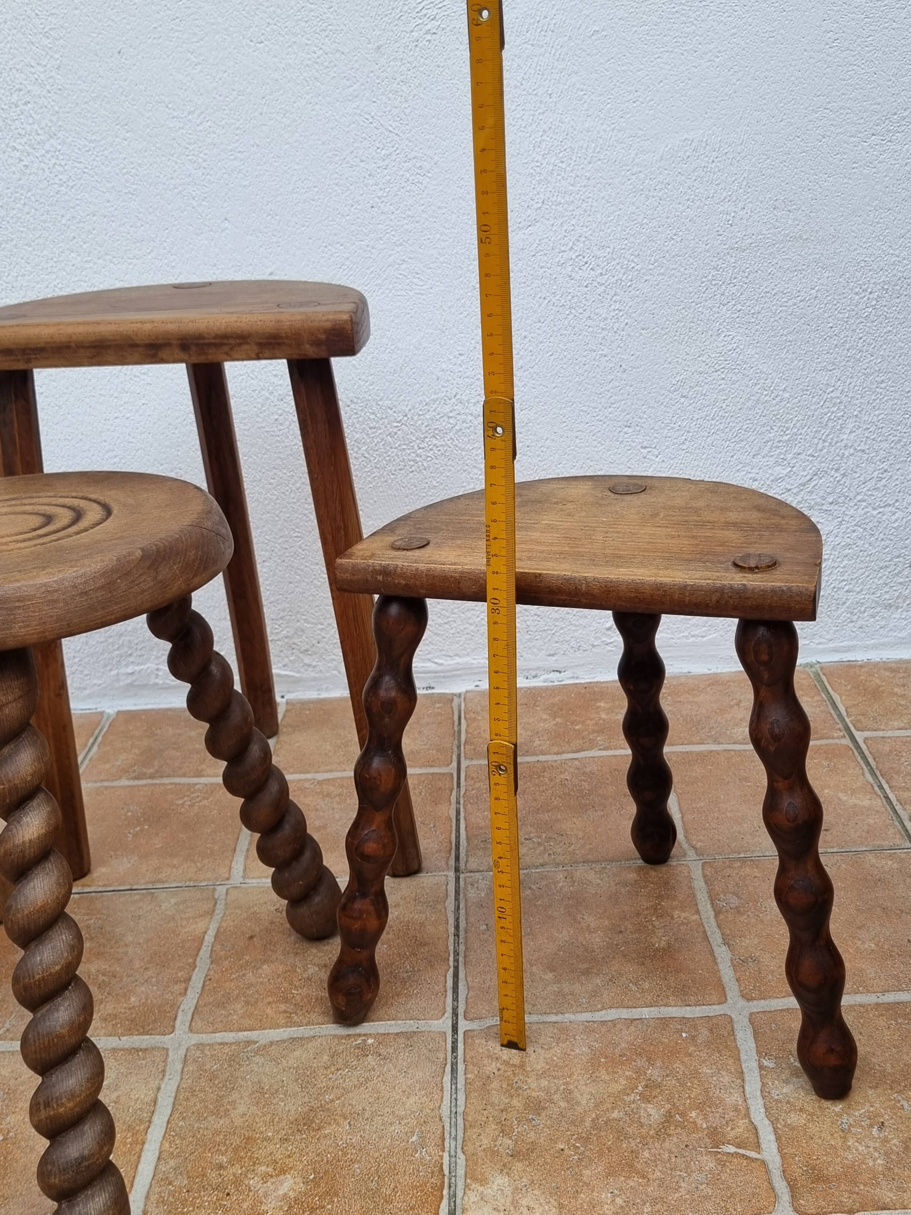 Set of four rustic solid wood plant holders, 31 to 43 cm