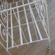 Wrought iron baby bed. Or bench seat of your choice