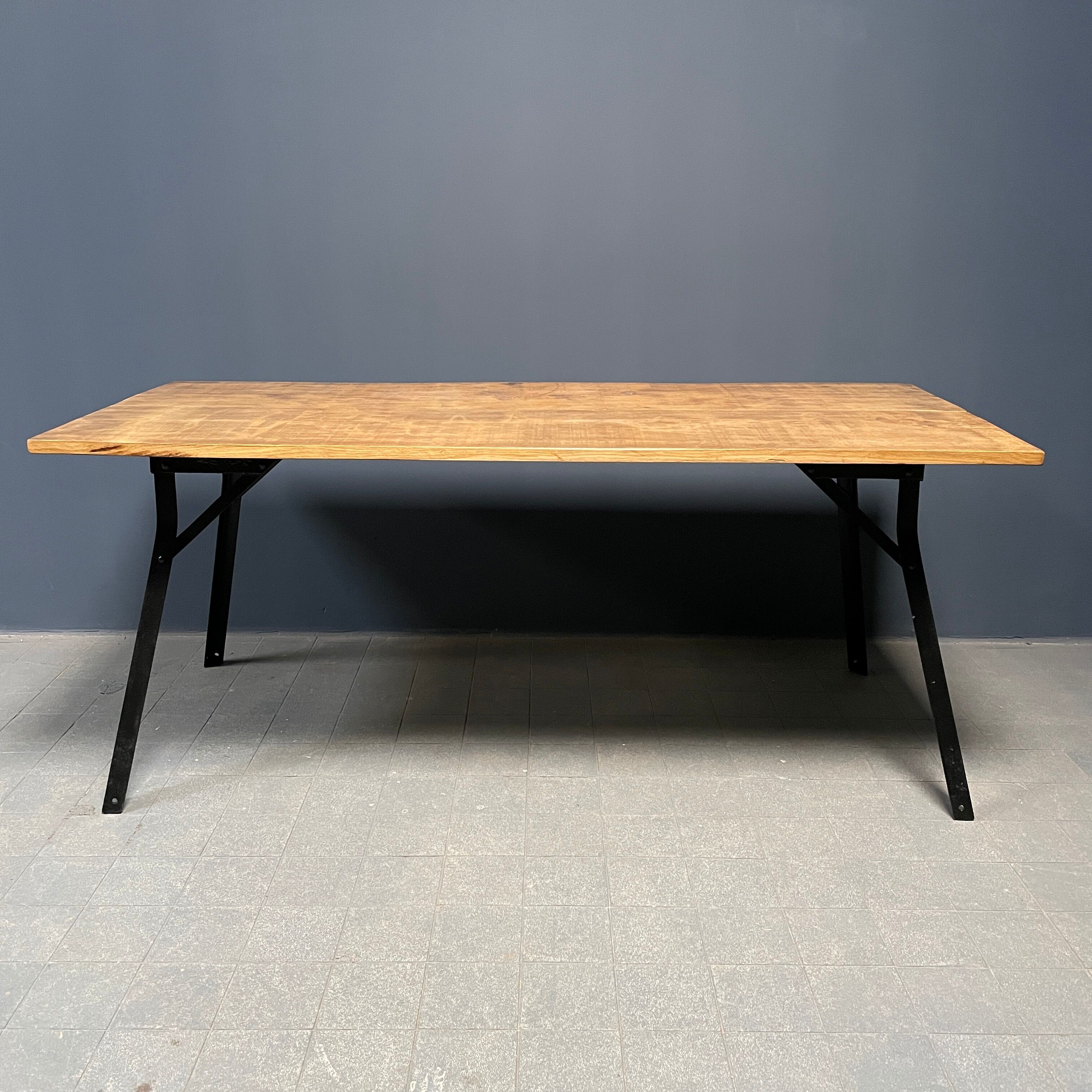 Handmade industrial oak dining table with black metal legs