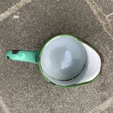 Vintage pitcher in green enameled sheet metal