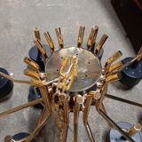 Black chandelier and gilded metal