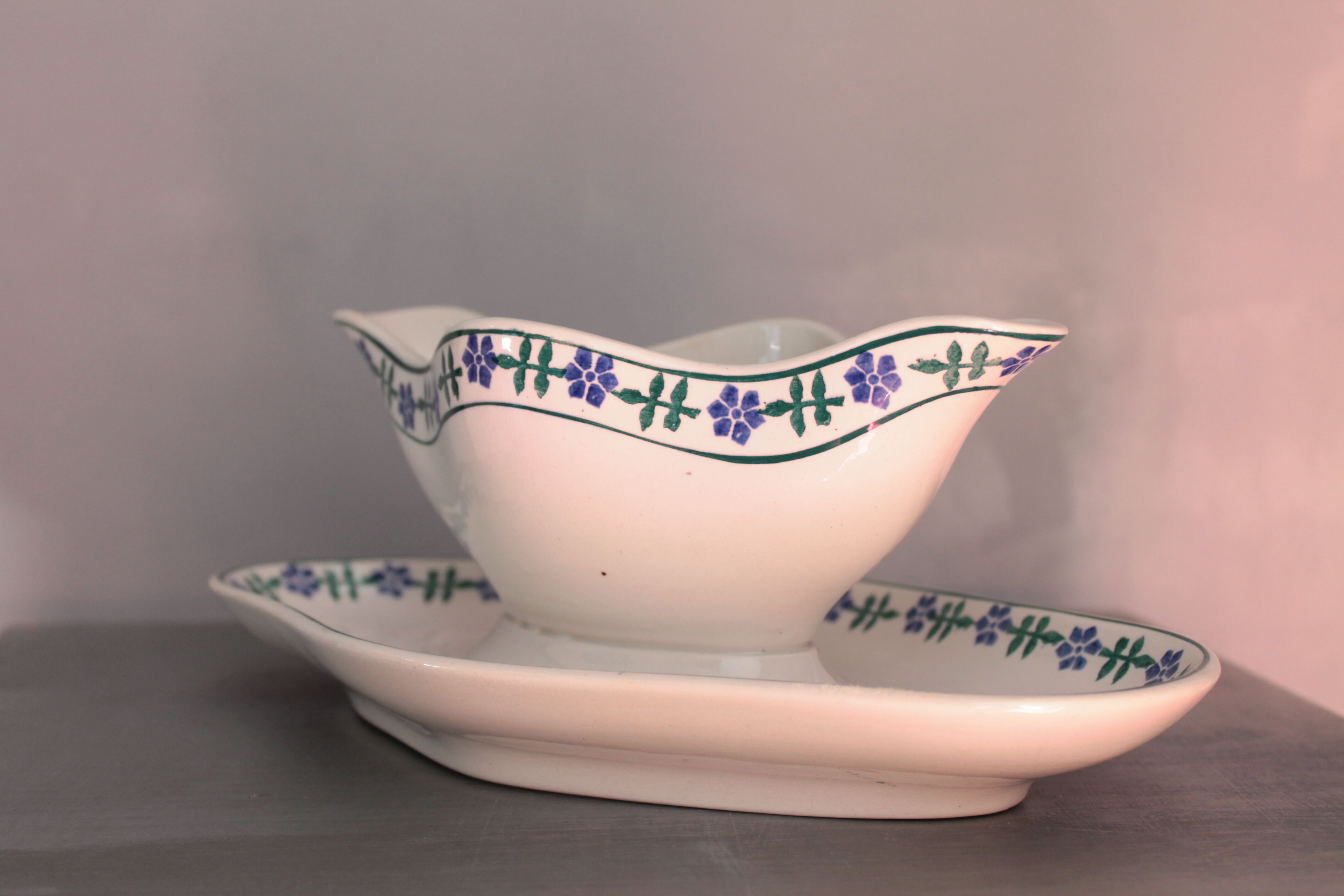 Old French white and blue gravy boat, in opaque porcelain, with blue flower pattern