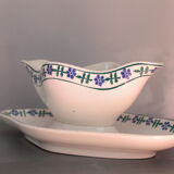 Saucière ancienne française blanche et bleue, en porcelaine opaque, à motif de fleurs bleues